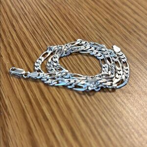 Sterling silver Figaro link necklace.